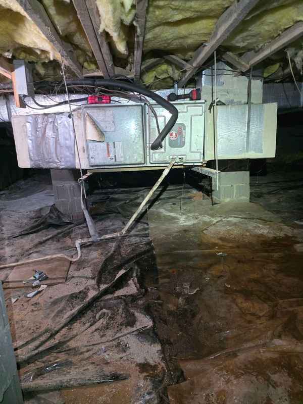 Air handler unit installed in a home's crawlspace