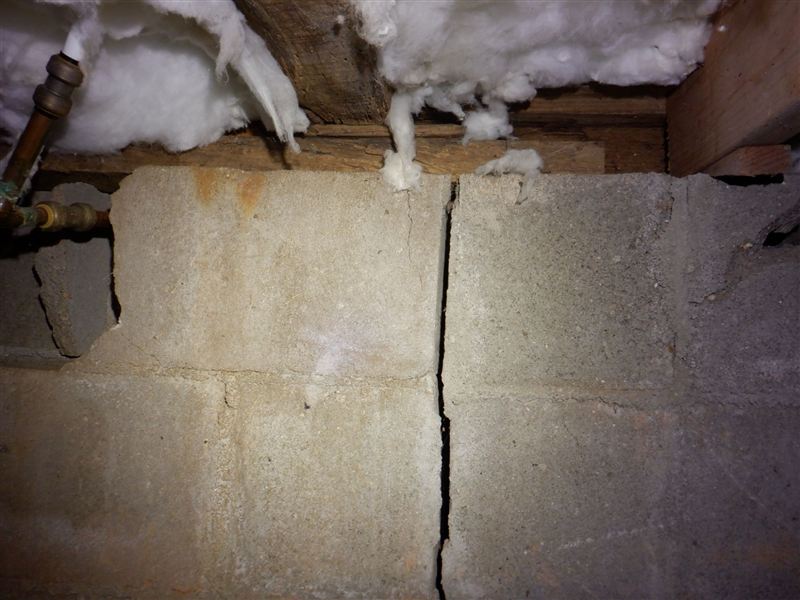 Vertical crack running through a home's foundation wall