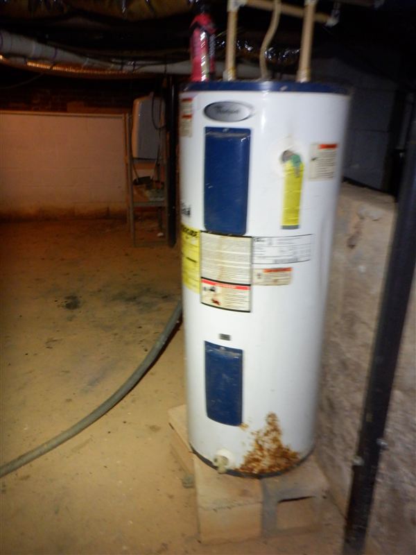 Rust around the base of a residential water heater